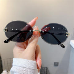 Cute oval shape rimless sunglasses