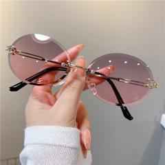 Cute oval shape rimless sunglasses