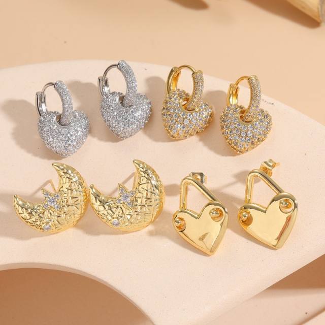 Gold color copper diamond heart huggie earrings
