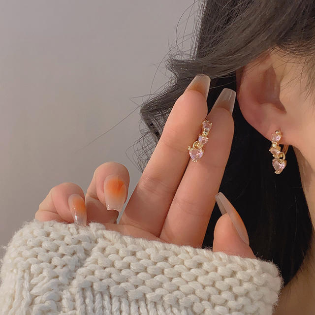 Delicate pink cubic zircon copper huggie earrings