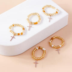 Y2K seed bead cross charm elastic stackable rings