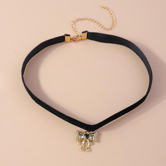 Vintage rhinestone bow black velvet choker necklace