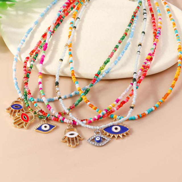 Boho colorful seed bead evil eye charm choker necklace