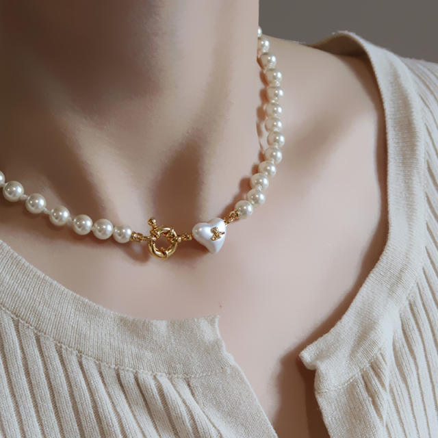 Famous brand pearl bead saturn choker necklace