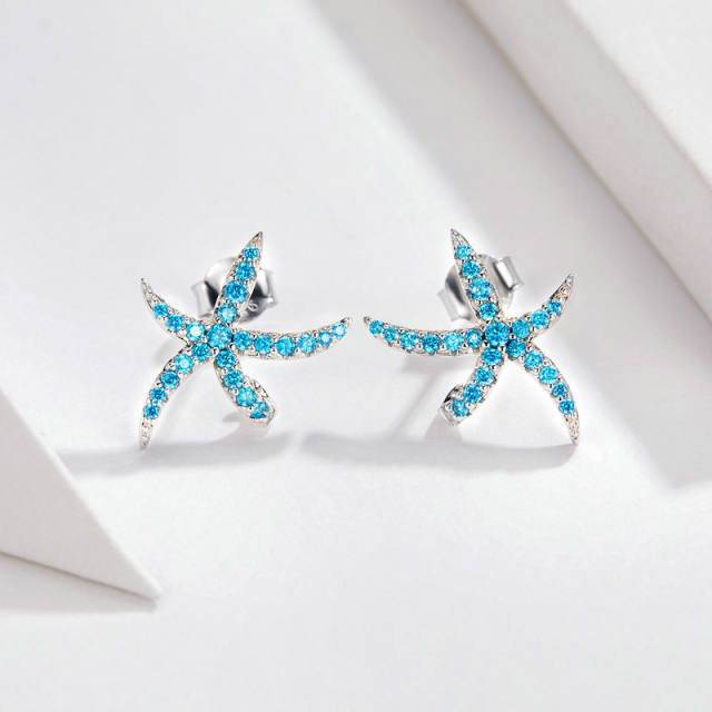 Delicate blue color diamond starfish sterling silver earrings