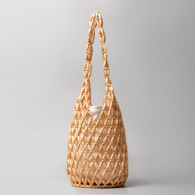 Hot sale handmade bead hollow out women bucket bag beach bag