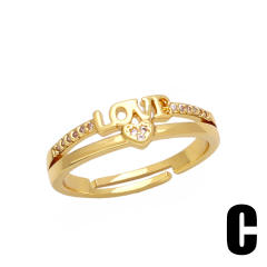 Vintage rainbow CZ statement bow gold plated copper rings