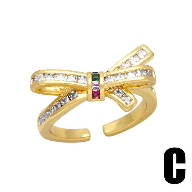 Vintage rainbow CZ statement bow gold plated copper rings