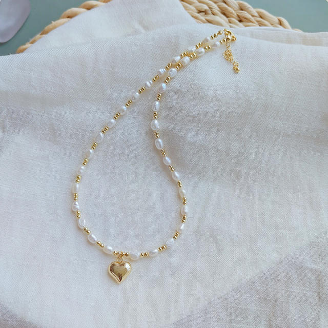 Elegant water pearl bead gold heart charm necklace