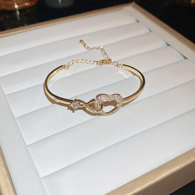 Delicate hollow out heart diamond bracelet