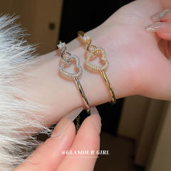 Delicate hollow out heart diamond bracelet