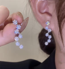 Delicate diamond snowflake shape earrings