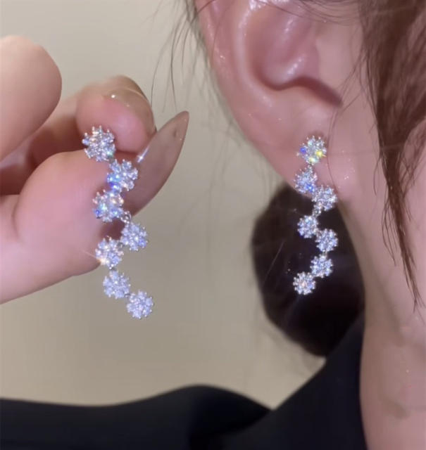 Delicate diamond snowflake shape earrings