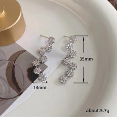 Delicate diamond snowflake shape earrings