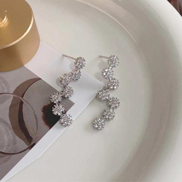Delicate diamond snowflake shape earrings