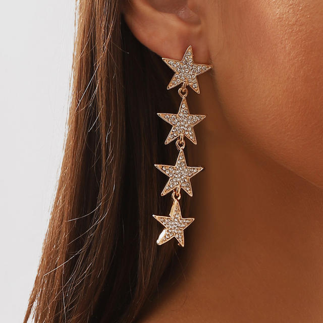 Delicate diamond star dangle earrings