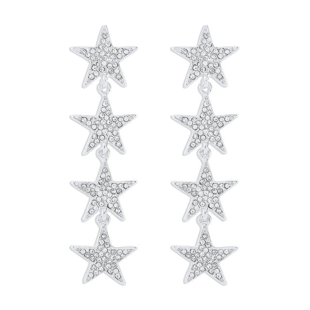 Delicate diamond star dangle earrings