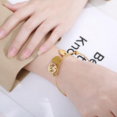 Delicate heart charm stainless steel bangle