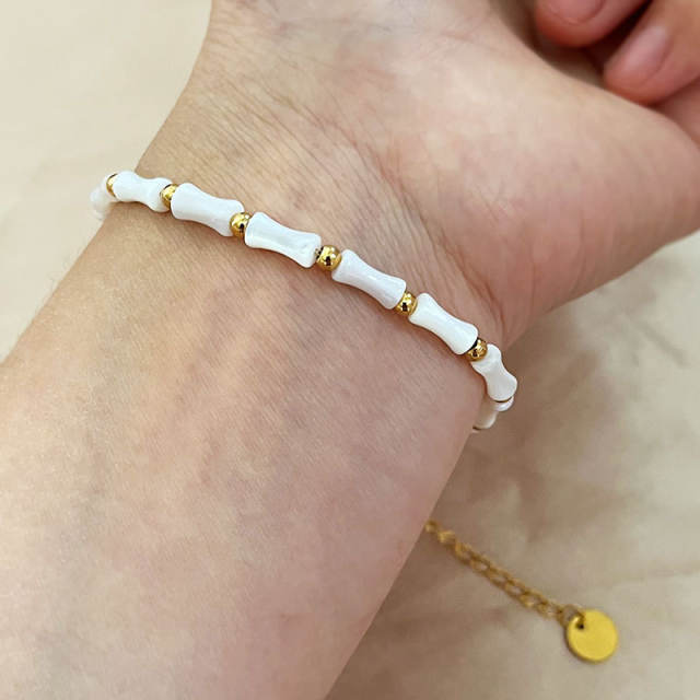 Summer white color bamboo shell stainless steel bead bracelet