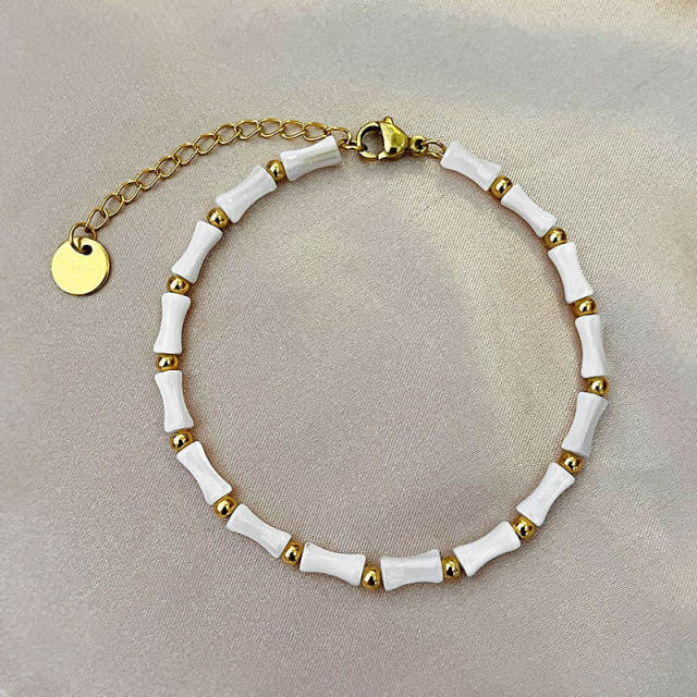 Summer white color bamboo shell stainless steel bead bracelet