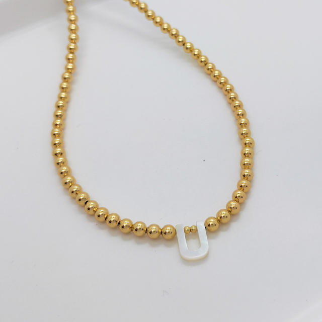 Natural shell initial letter gold plated copper beaded necklace