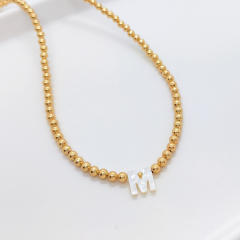 Natural shell initial letter gold plated copper beaded necklace