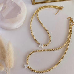Natural shell initial letter gold plated copper beaded necklace