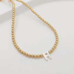 Natural shell initial letter gold plated copper beaded necklace