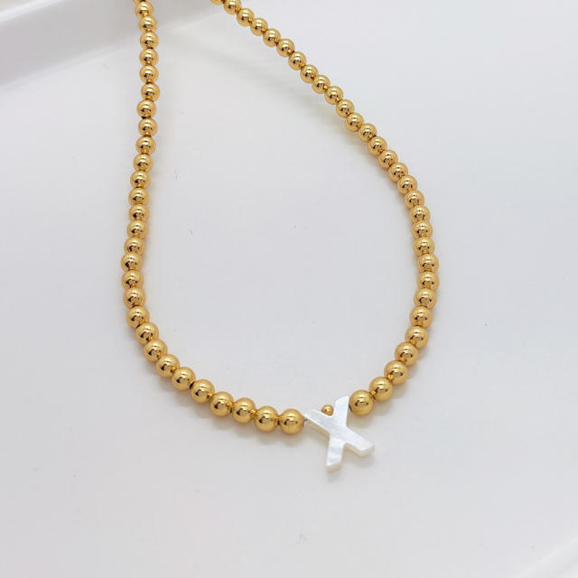 Natural shell initial letter gold plated copper beaded necklace