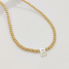 Natural shell initial letter gold plated copper beaded necklace