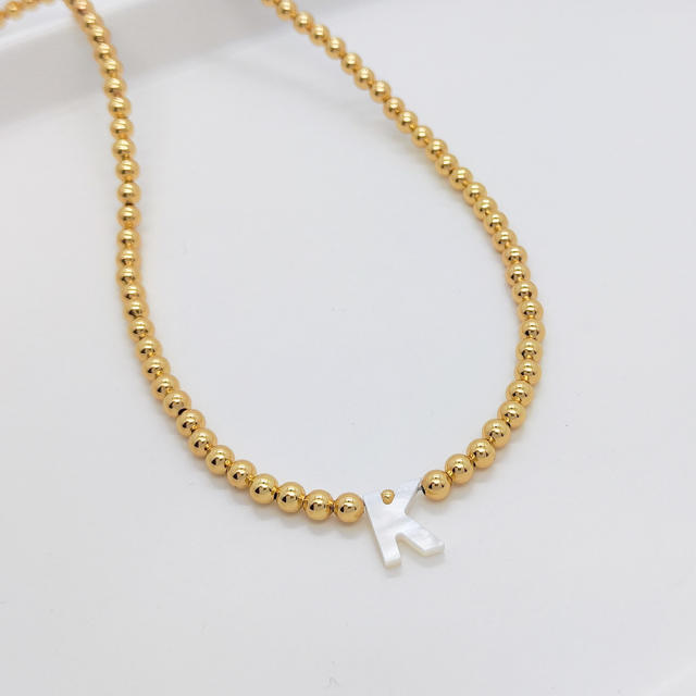 Natural shell initial letter gold plated copper beaded necklace