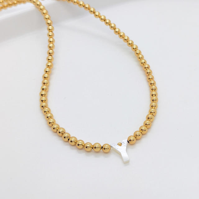 Natural shell initial letter gold plated copper beaded necklace