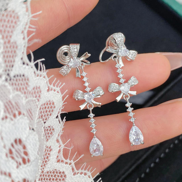 Delicate diamond bow dangle earrings clip on earrings