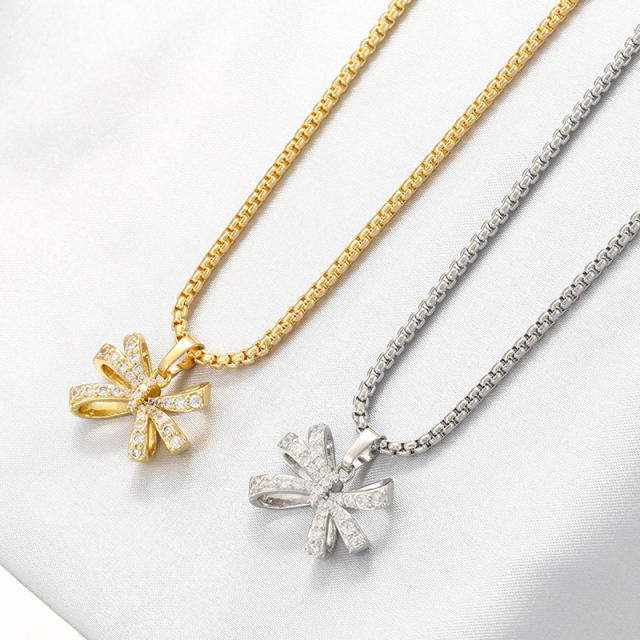 Delicate hollow out diamond bow gold plated copper necklace