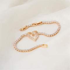 Delicate diamond heart gold plated copper tennis bracelet
