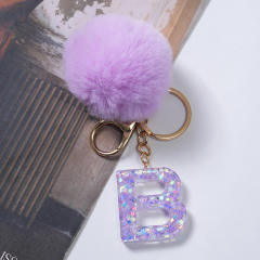 Cute purple color fluffy ball initial letter keychain