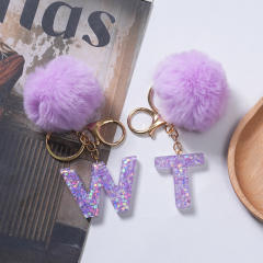 Cute purple color fluffy ball initial letter keychain