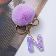 Cute purple color fluffy ball initial letter keychain