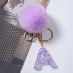 Cute purple color fluffy ball initial letter keychain