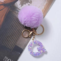 Cute purple color fluffy ball initial letter keychain