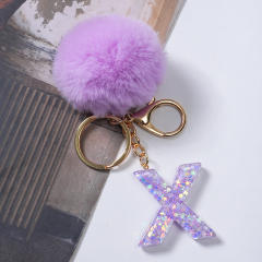Cute purple color fluffy ball initial letter keychain