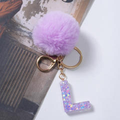 Cute purple color fluffy ball initial letter keychain