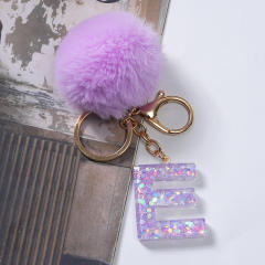 Cute purple color fluffy ball initial letter keychain