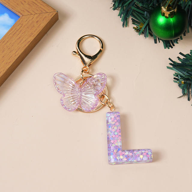 Purple color butterfly initial letter keychain