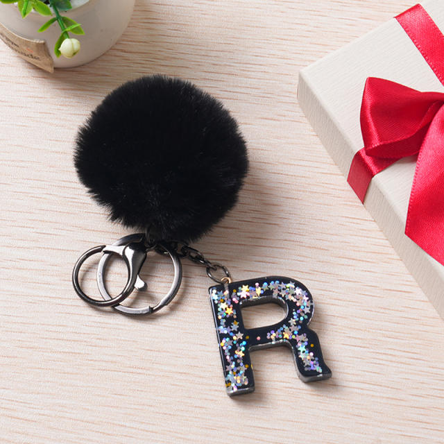 Black color fluffy ball initial letter keychain