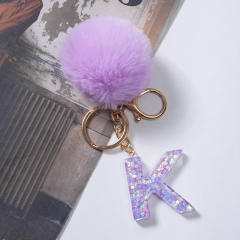 Cute purple color fluffy ball initial letter keychain