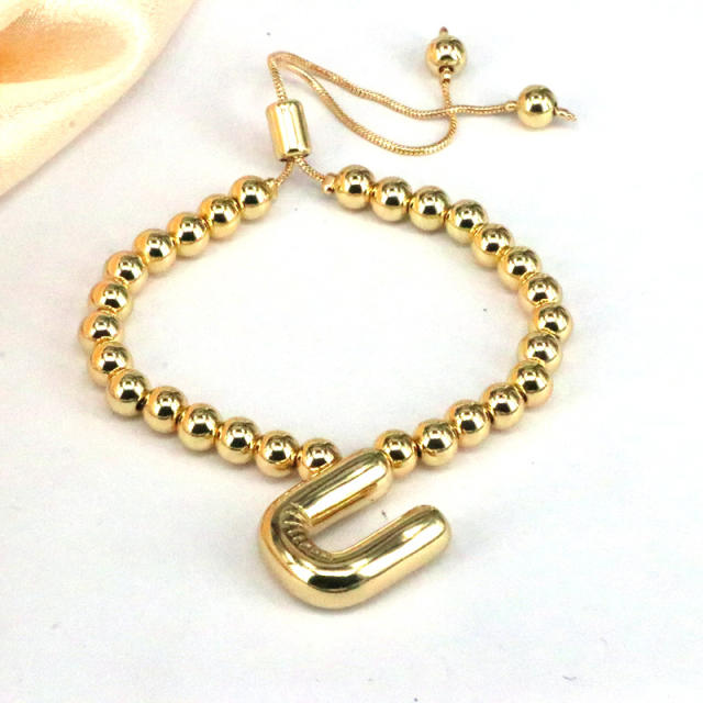 Chunky bubble initial letter charm gold plated copper beaded bracelet