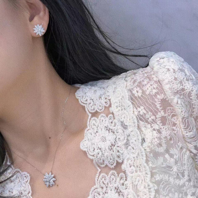 Delicate diamond snowflake studs earrings