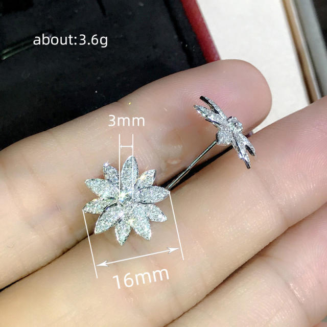 Delicate diamond snowflake studs earrings