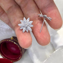 Delicate diamond snowflake studs earrings